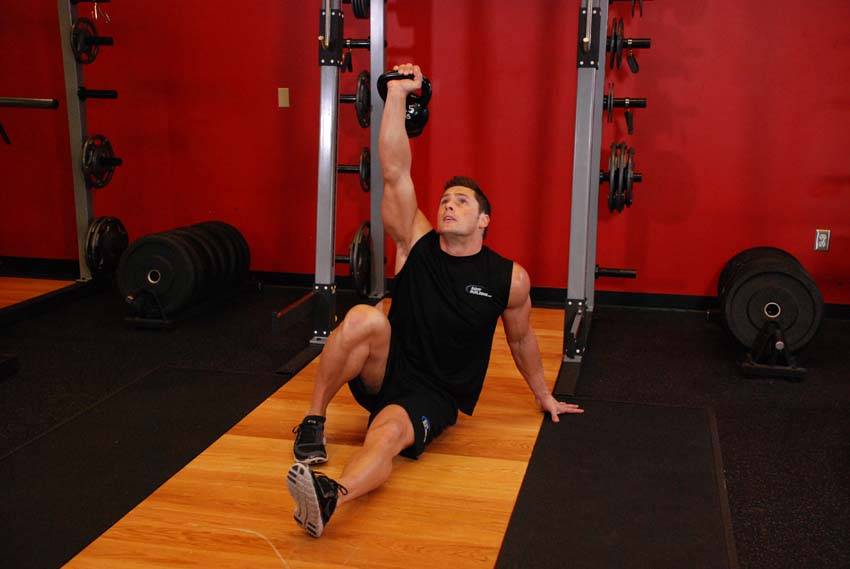 Dumbbell Get-Up - Finish position